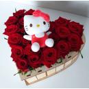 Heart of roses with a toy